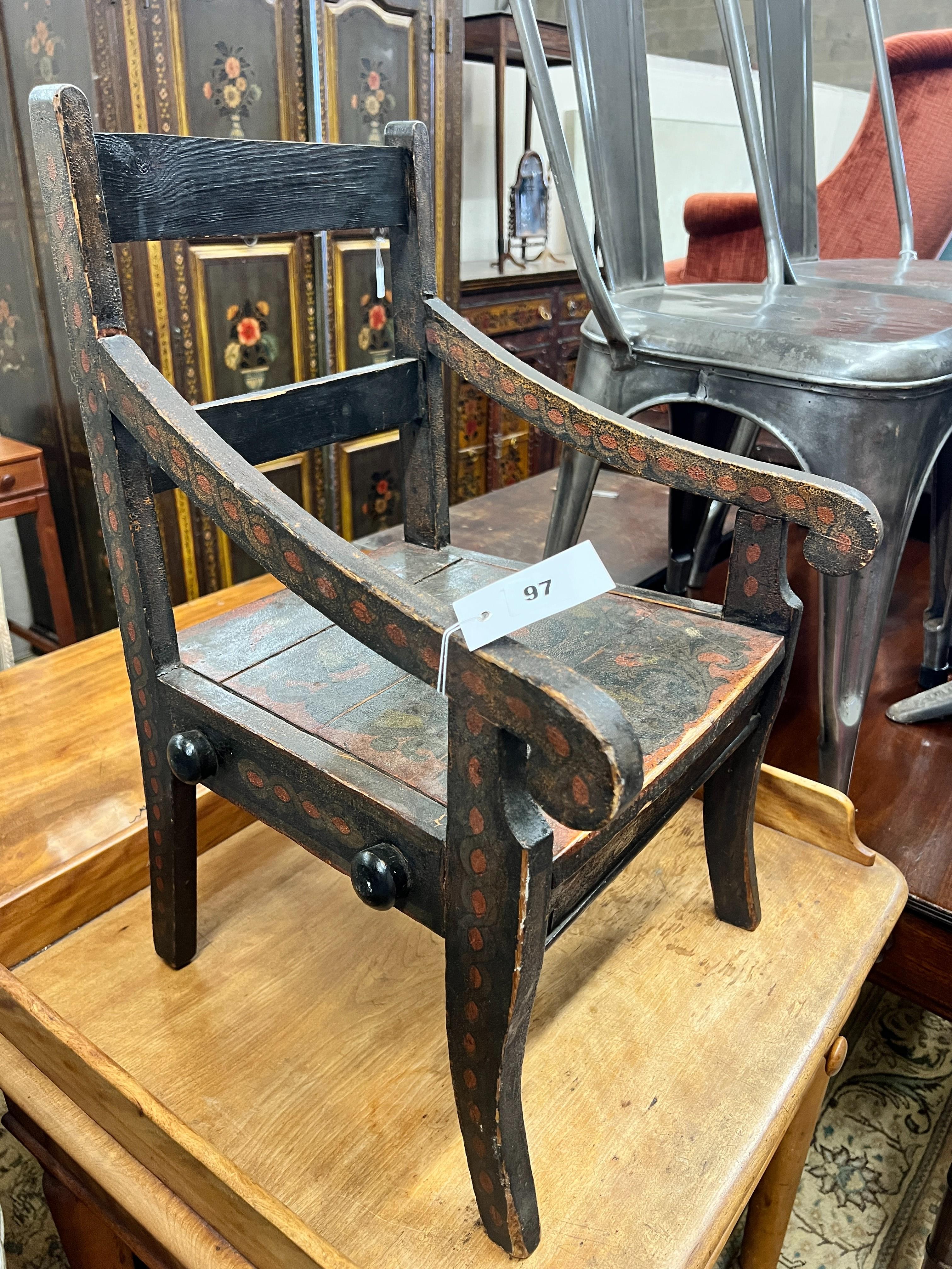 A 19th century and later provincial painted child's chair